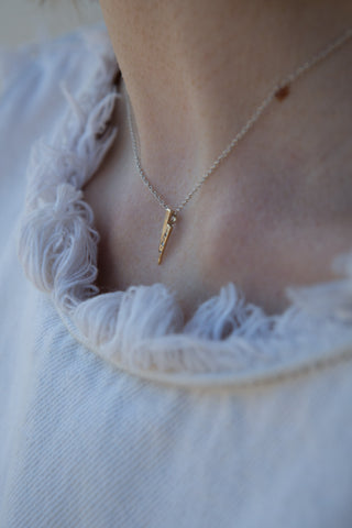 Gold on gold razor necklace with white diamonds