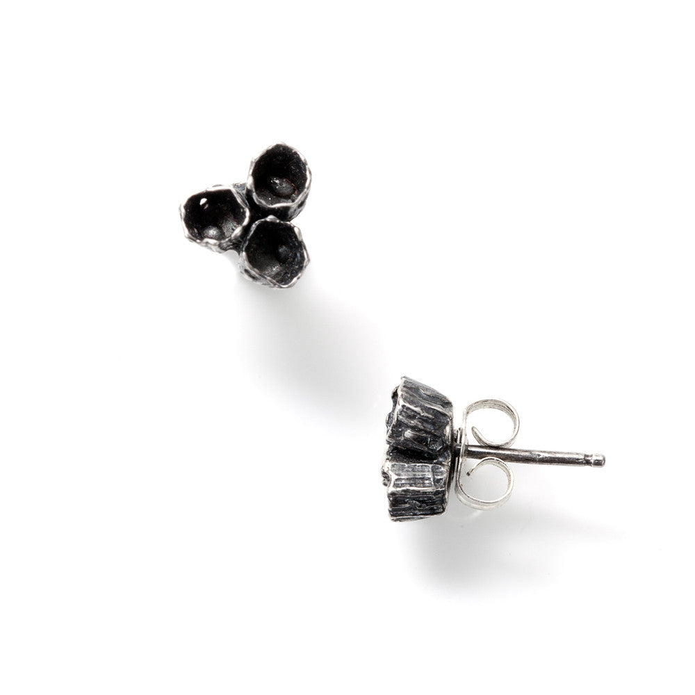 Oxidized cluster barnacle studs