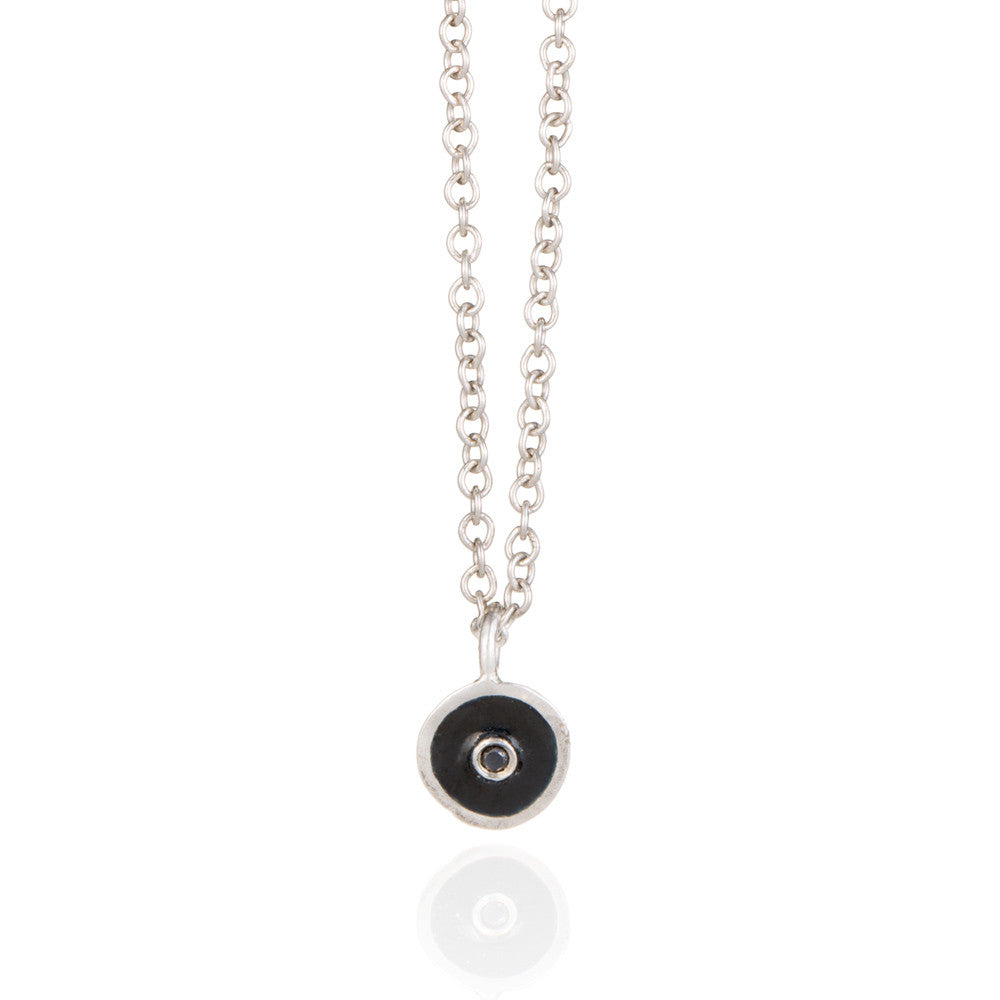 Black droplet with black diamond