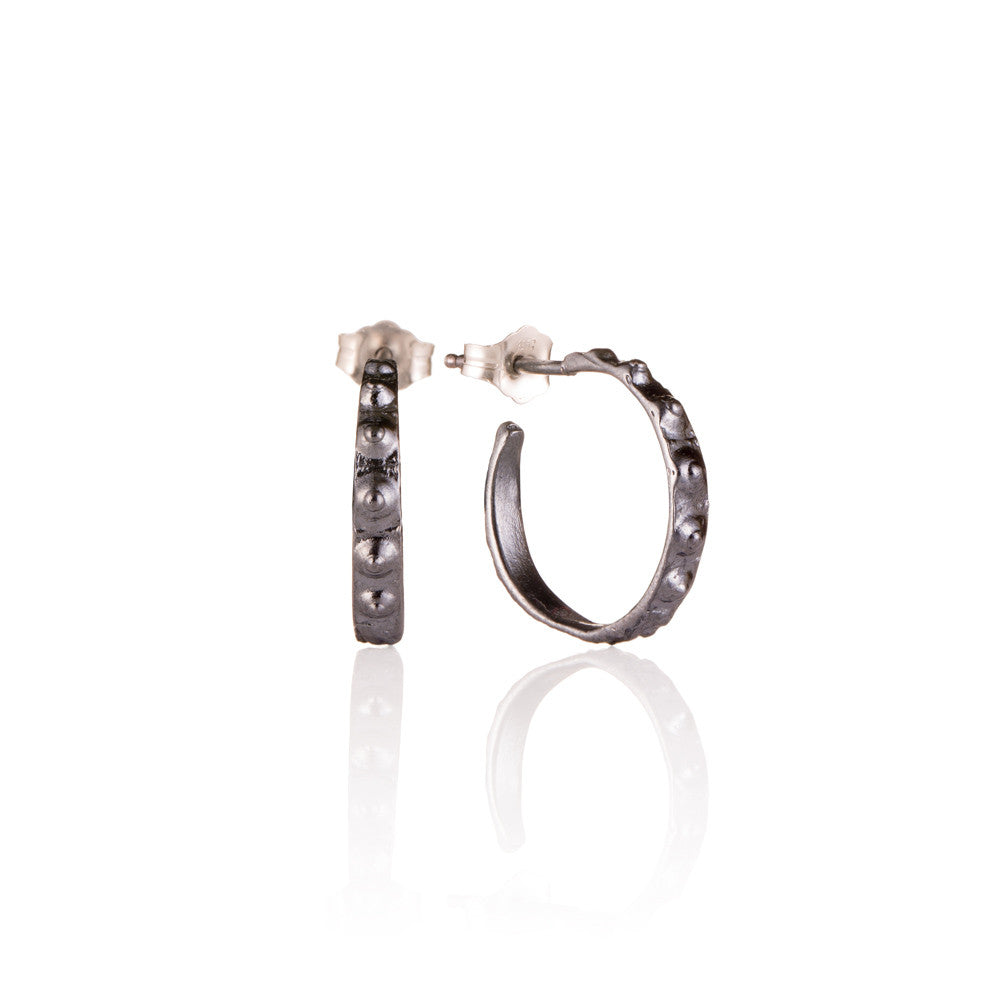 Oxidized baby sea urchin hoops